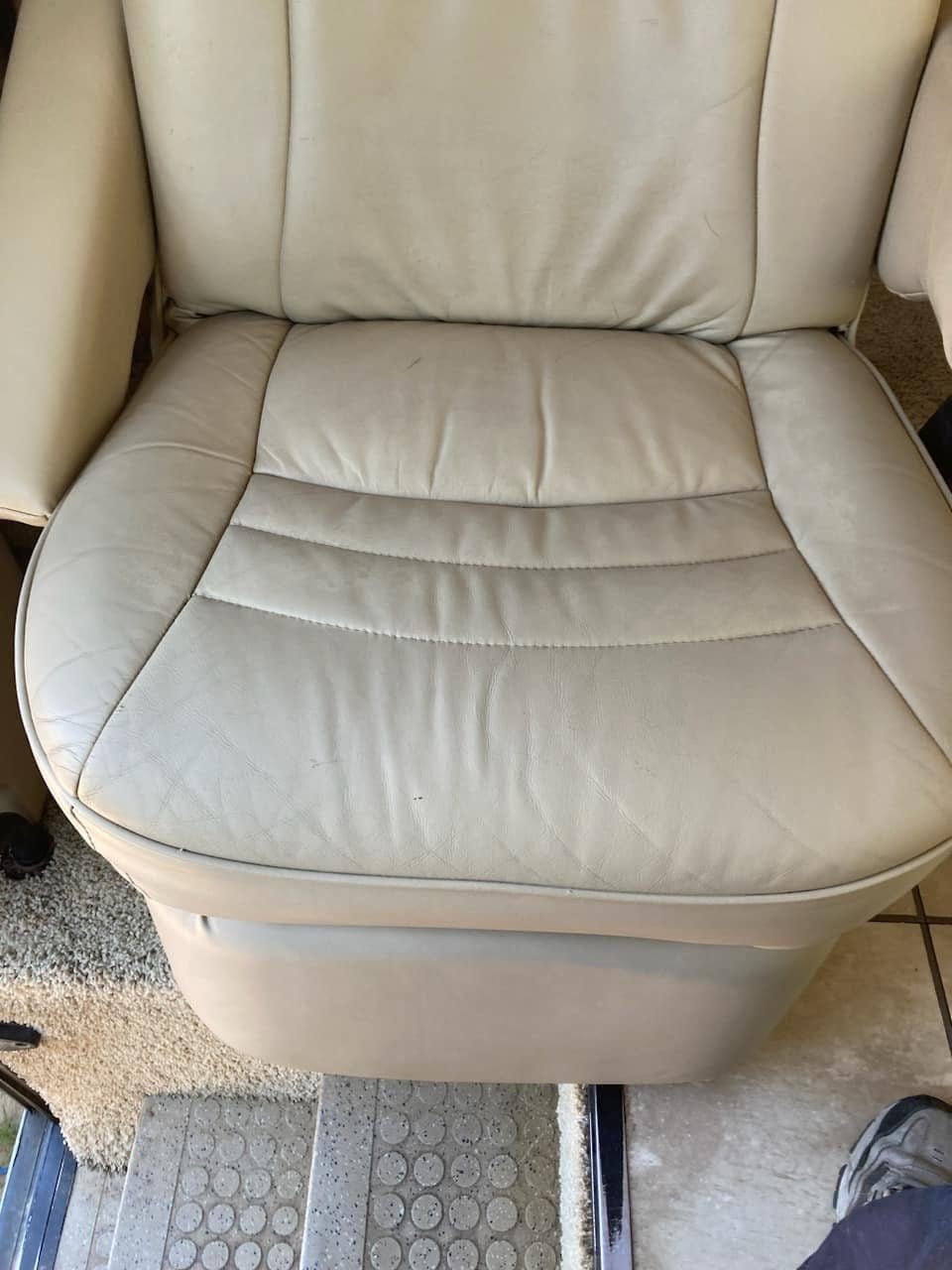 Cream leather cushioned seat, cleaned, Shelton CT